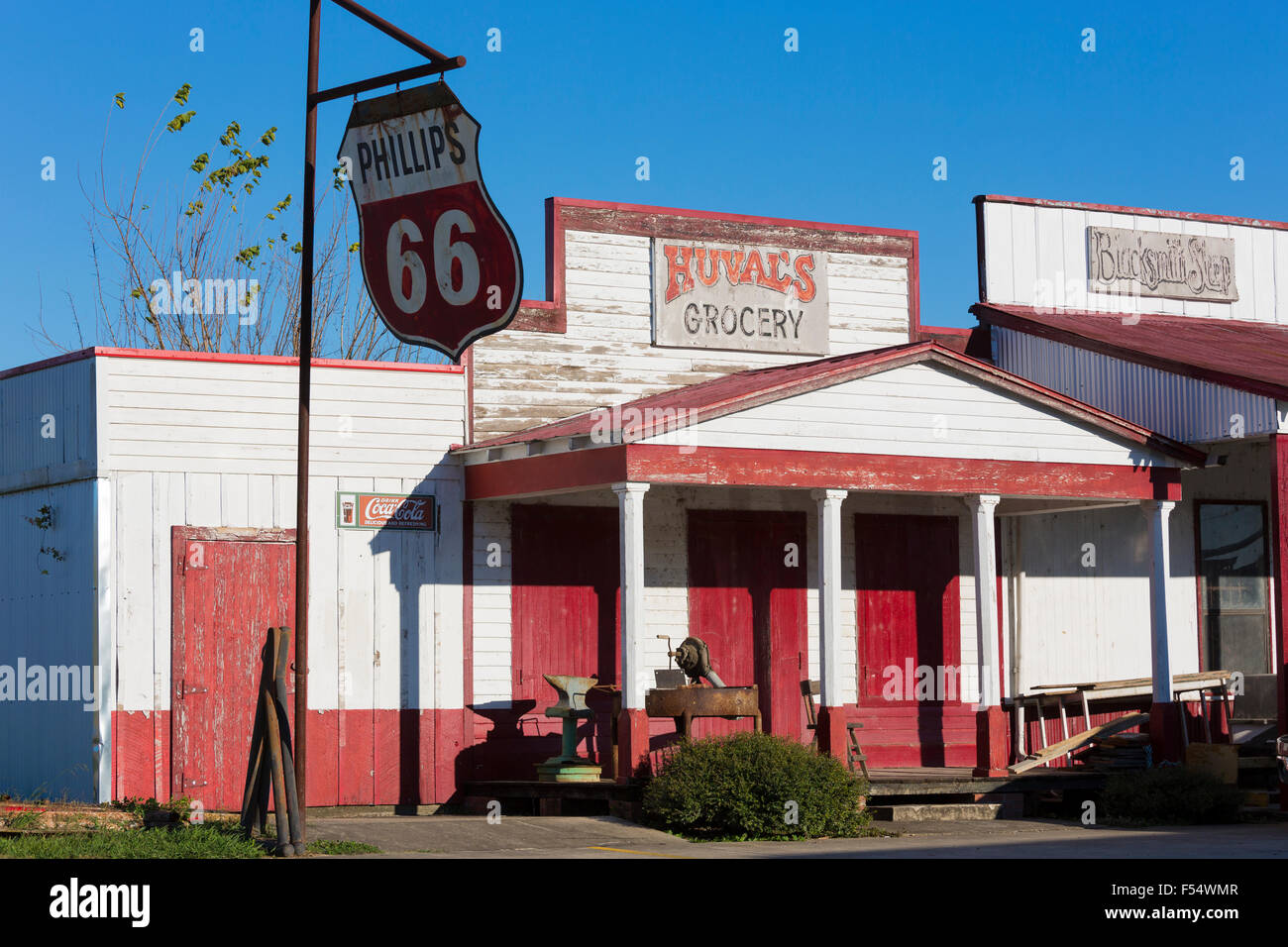 Preservation of Huval's Grocery Store with Phillips 66 sign as retro Cajun culture by