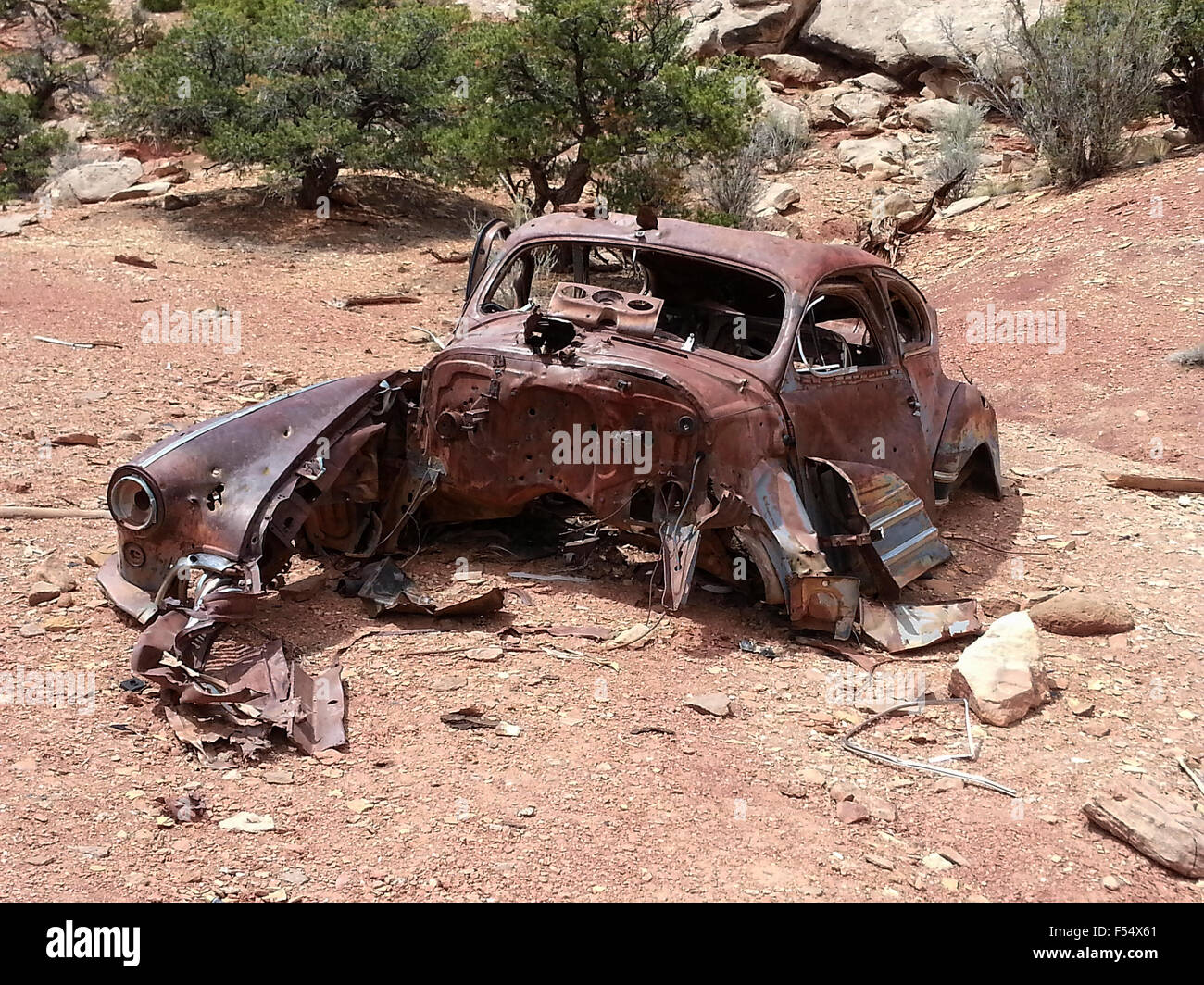 Old rusted car desert mine camp, Utah Stock Photo - Alamy