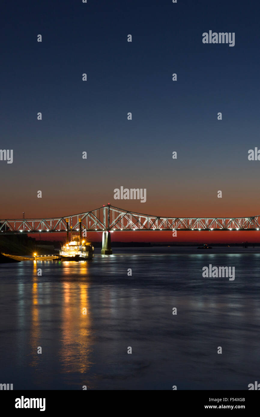 Nighttime scene illuminated iron cantilever Natchez Vidalia Bridge