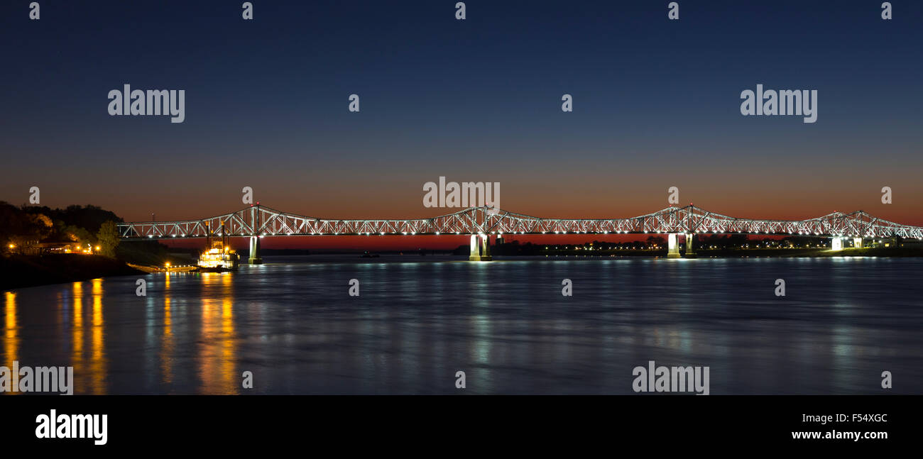 Nighttime scene illuminated iron cantilever Natchez Vidalia Bridge