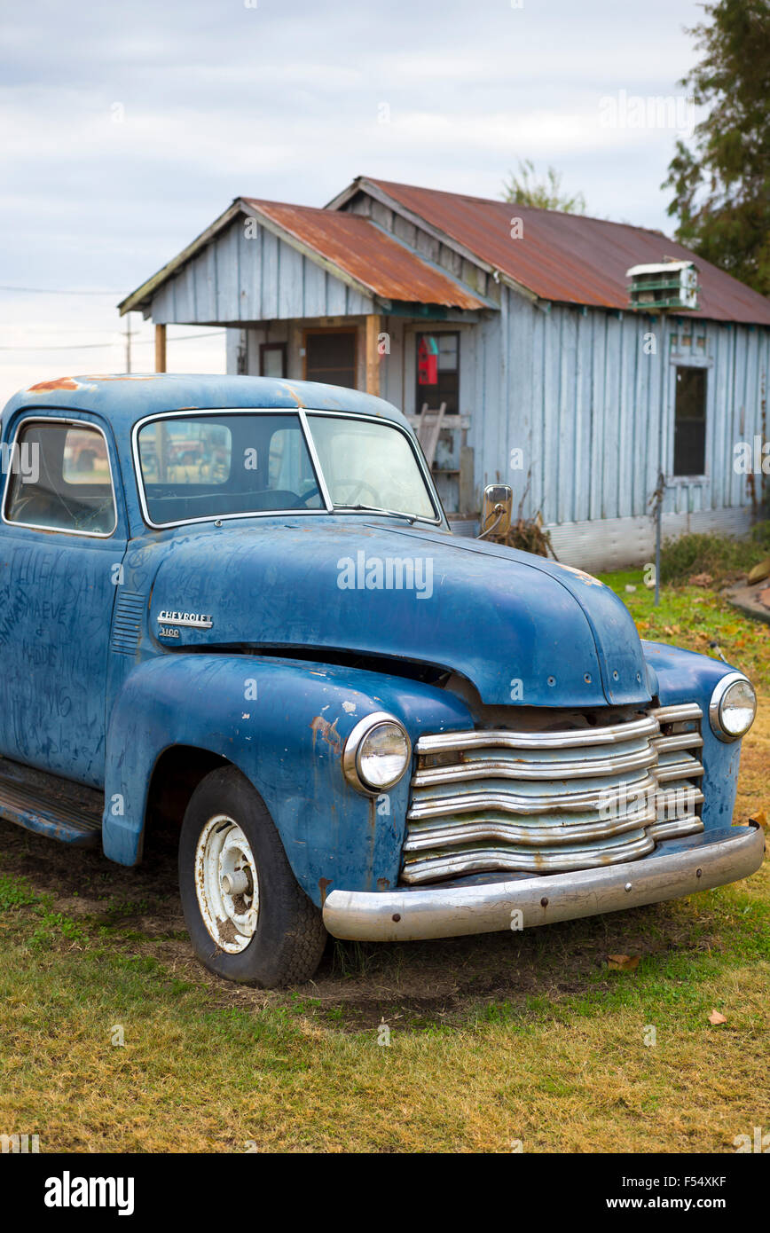 Old Chevrolet 3100 pickup truck by guest cabin at The Shack Up Inn cotton pickers themed hotel, Clarksdale, Mississippi, USA Stock Photo