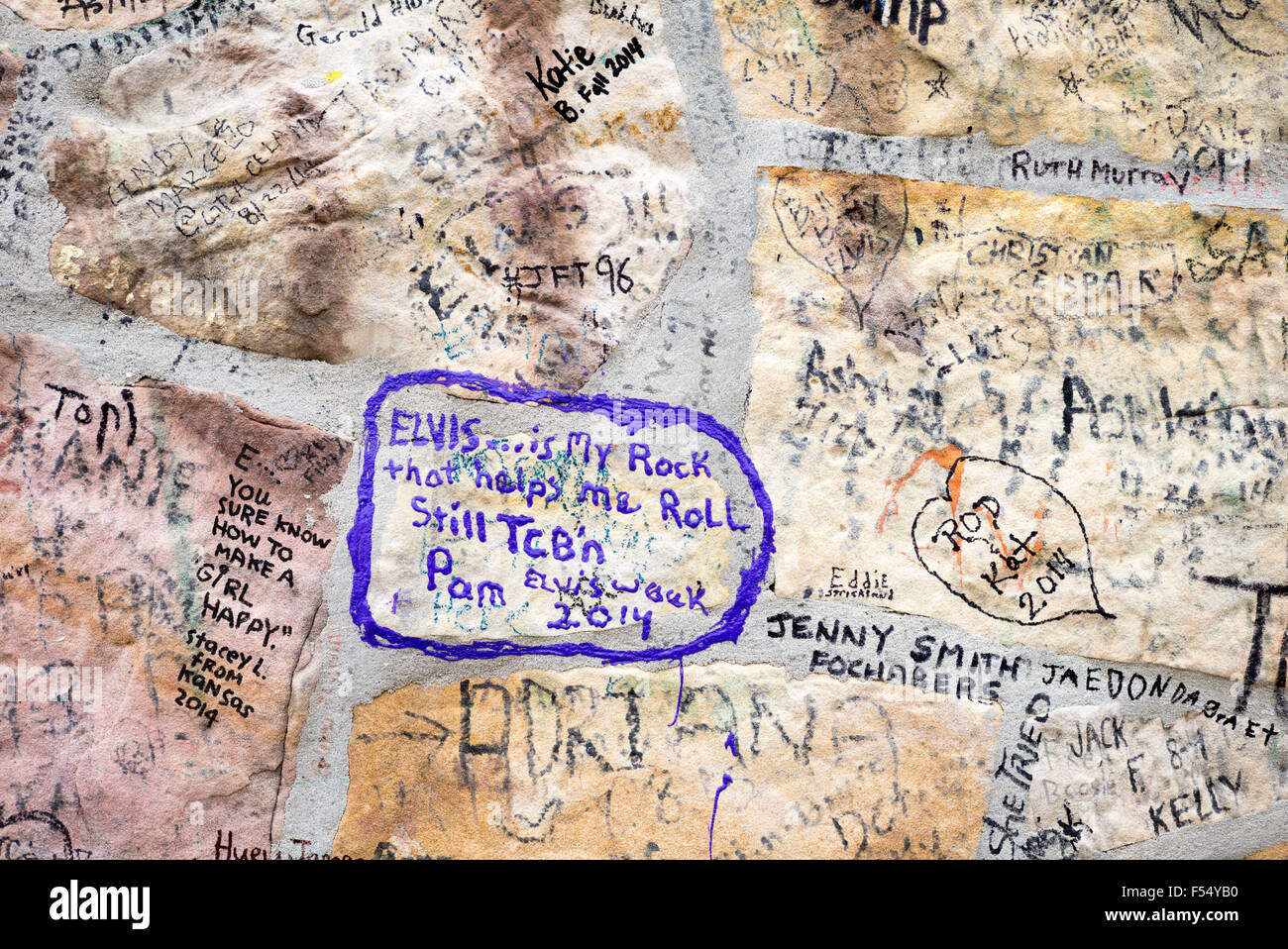 Love messages from adoring fans, graffiti on wall at Graceland, home of
