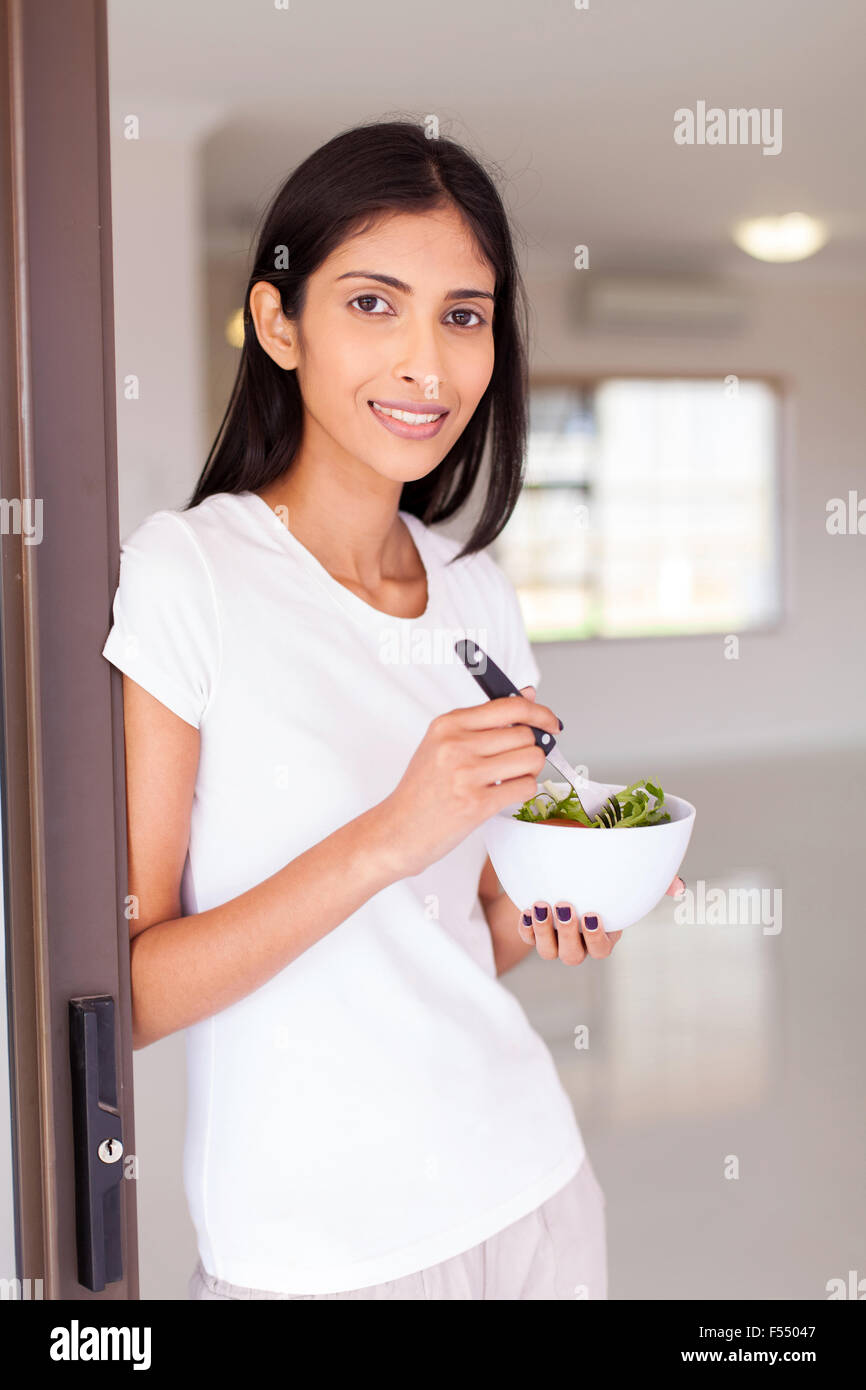 portrait of pretty Indian woman eating salad at home Stock Photo Alamy
