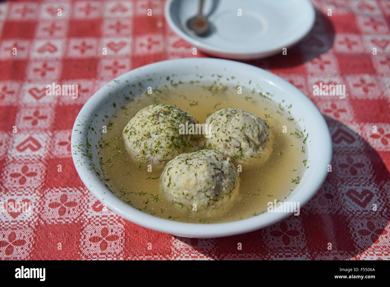 Canderli (knödel), a bread dumpling soup, specialty of the Tyrol region of Italy and Austria Stock Photo