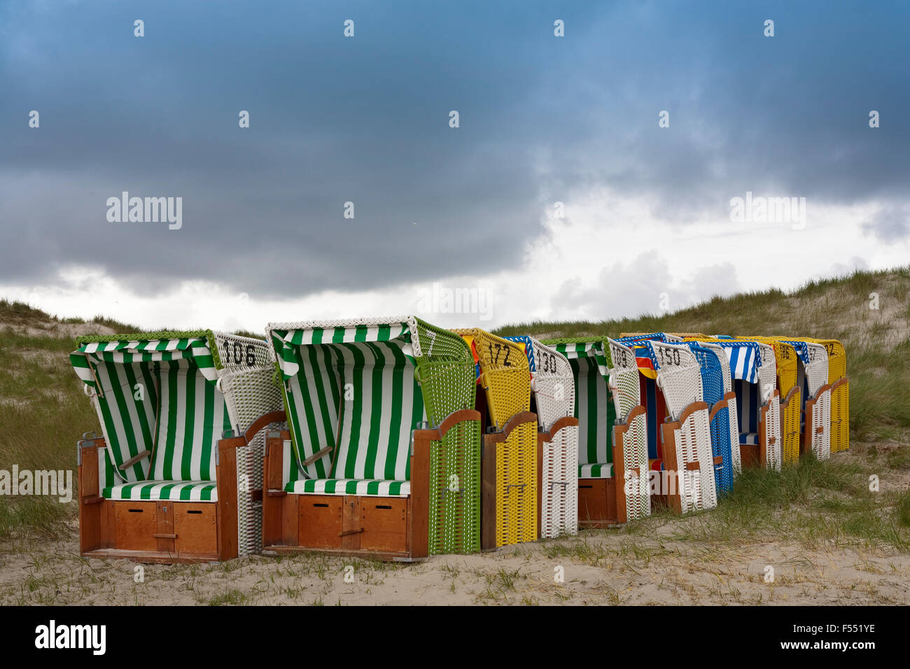 DEU, Germany, Schleswig-Holstein, North Sea,  Amrum island, beach chairs in the dunes near Norddorf.  DEU, Deutschland, Schleswi Stock Photo