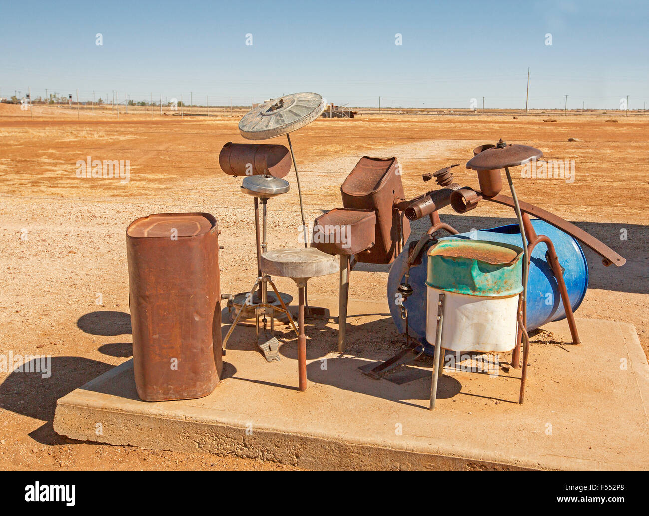Drum kit made from recycled rubbish at musical fence, a popular tourist attraction at Winton in outback Australia Stock Photo