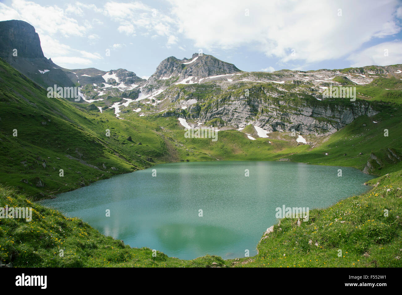 Idyllic view of Swiss Alps against sky Stock Photo