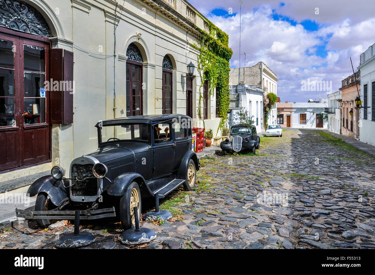 Old black automobile on the street of Colonia del Sacramento, a colonial city in Uruguay. Stock Photo