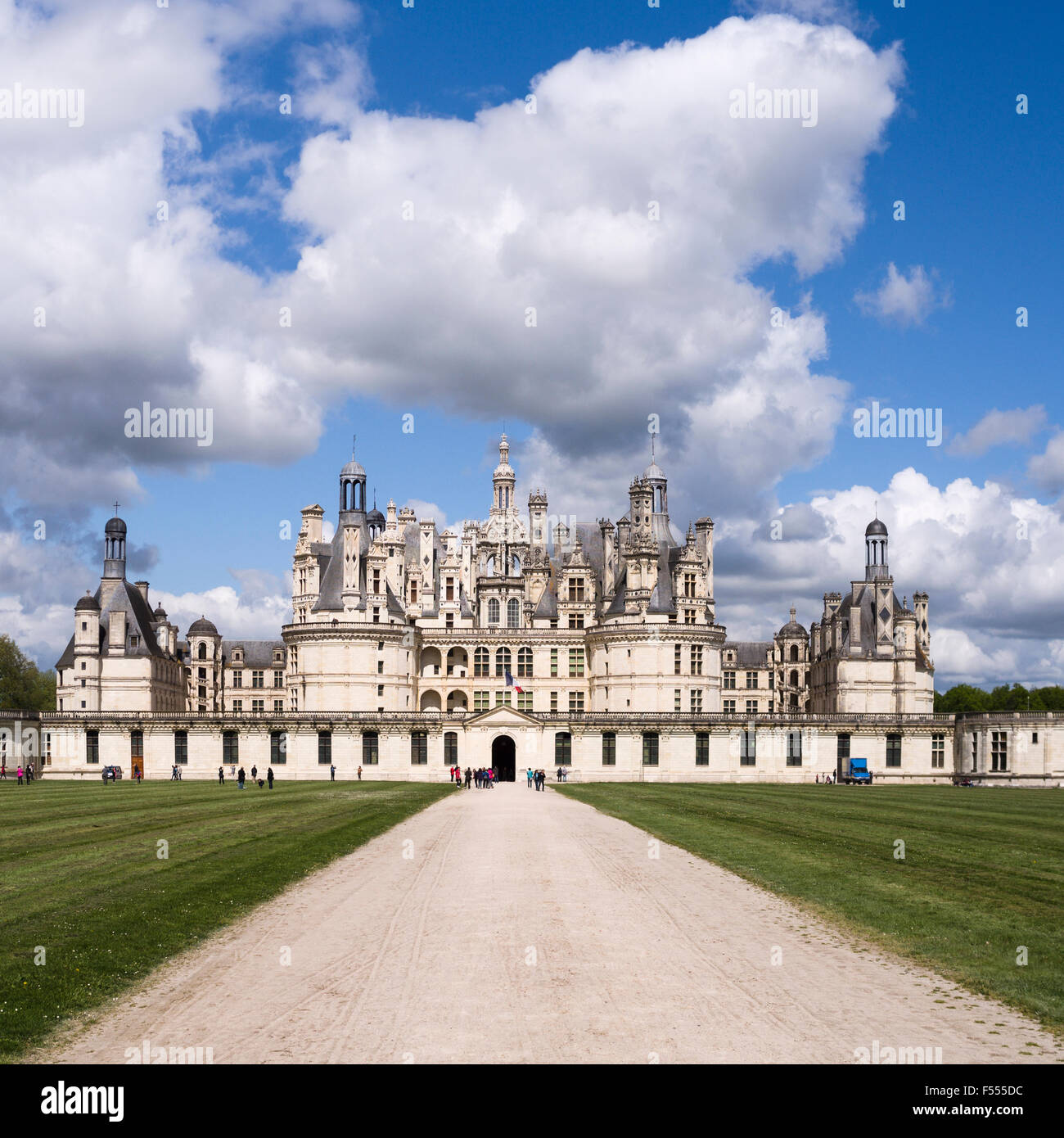 Chambord and the front Drive. A detailed image of the huge Château of Chambord  from the front driveway. Clouds billow. Stock Photo