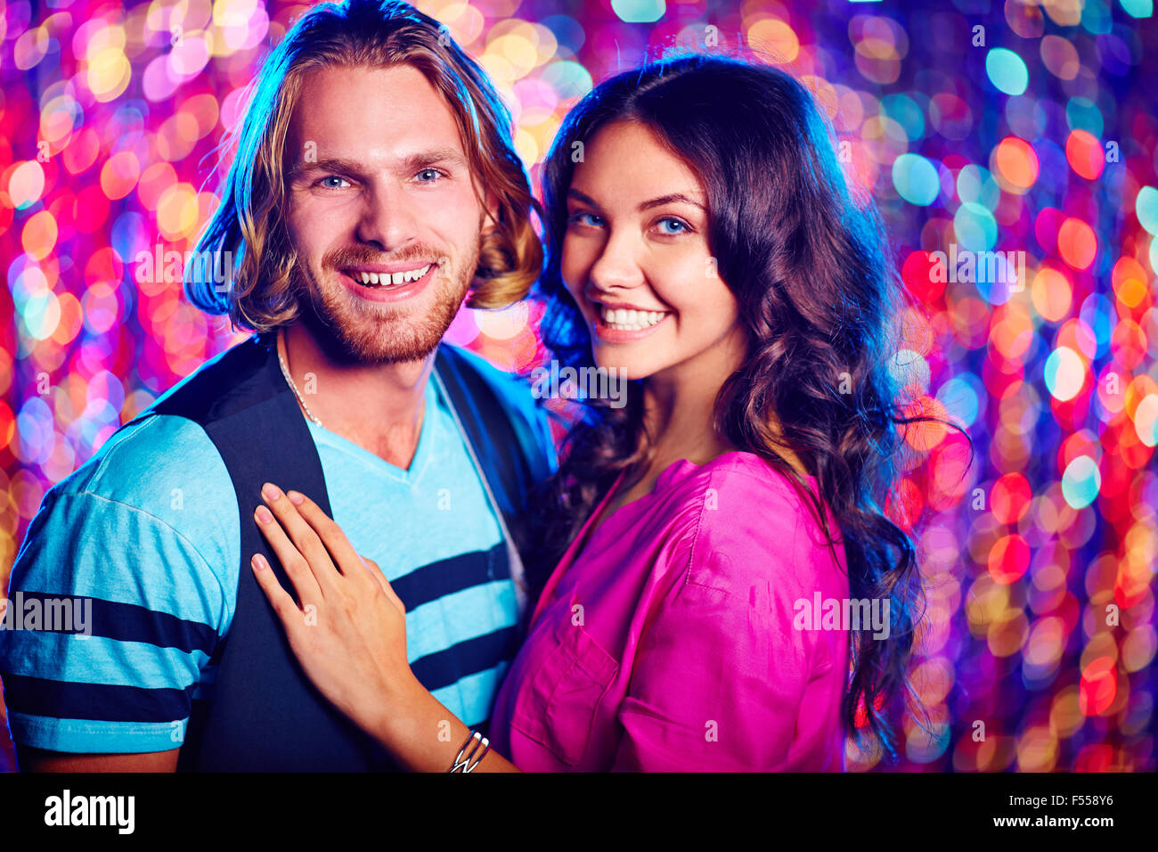 Young couple spending time at nightclub Stock Photo