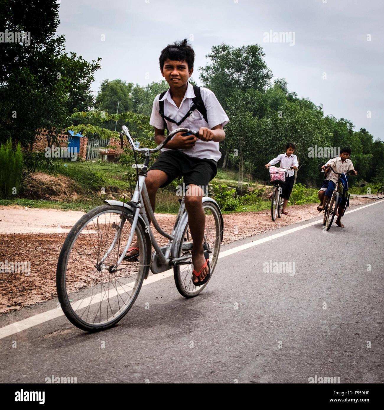 School children ride home from school near Siem Reap Cambodia