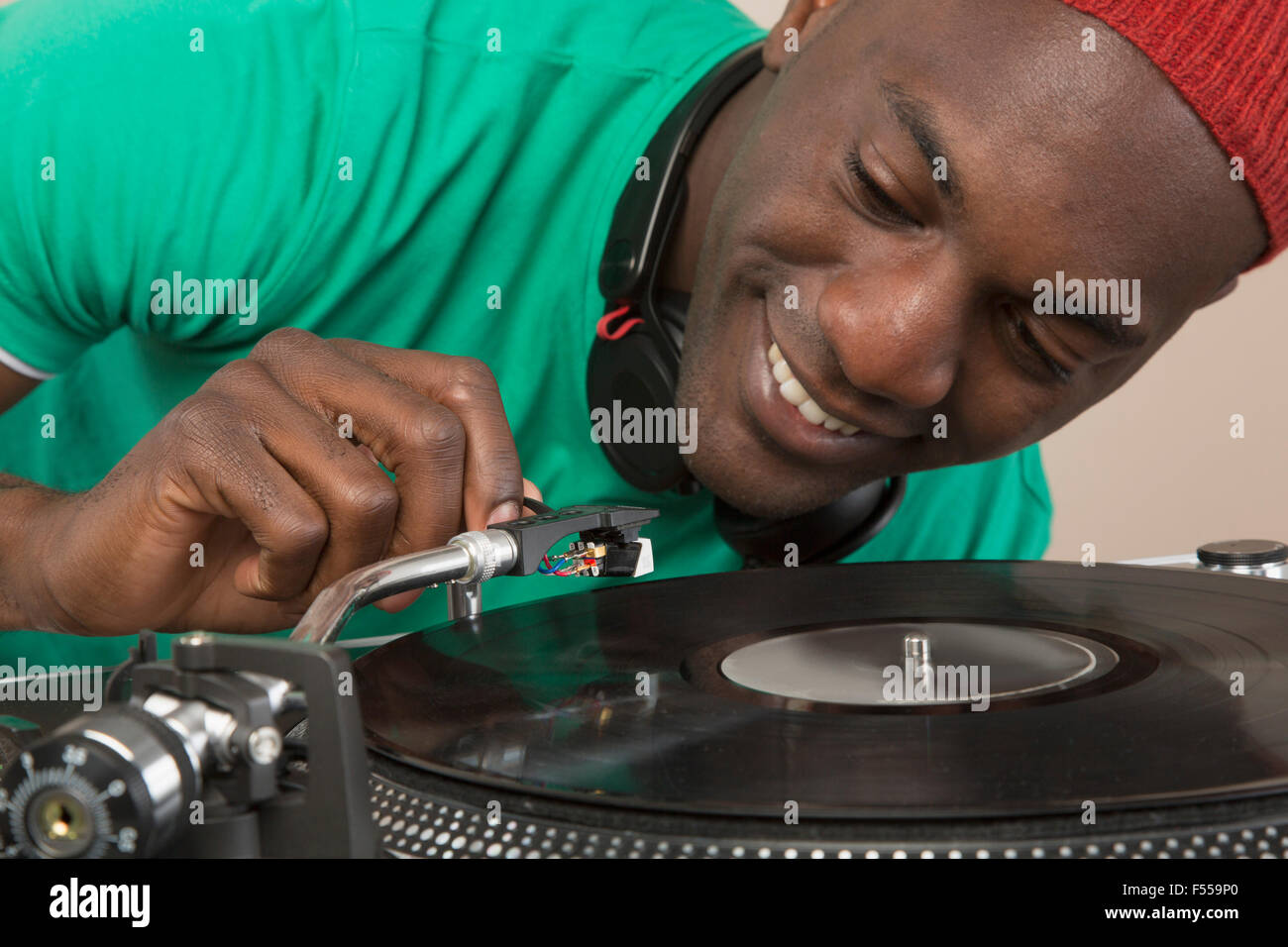 DJ using turntable Stock Photo Alamy