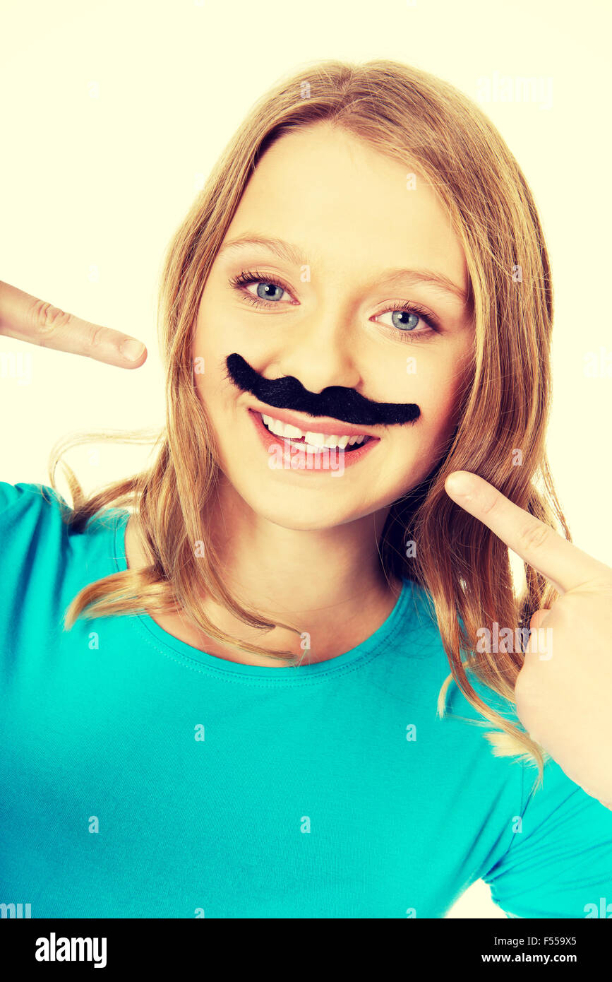Happy young woman with a moustache Stock Photo