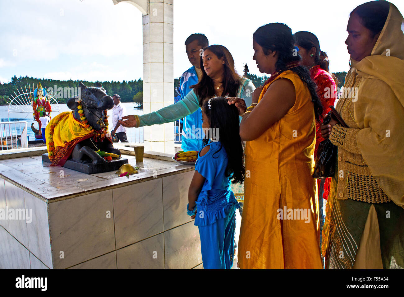 Hindu pilgrims worshiping at shrine of temple Ganga Talao, Grand Bassin, Island Mauritius Stock Photo