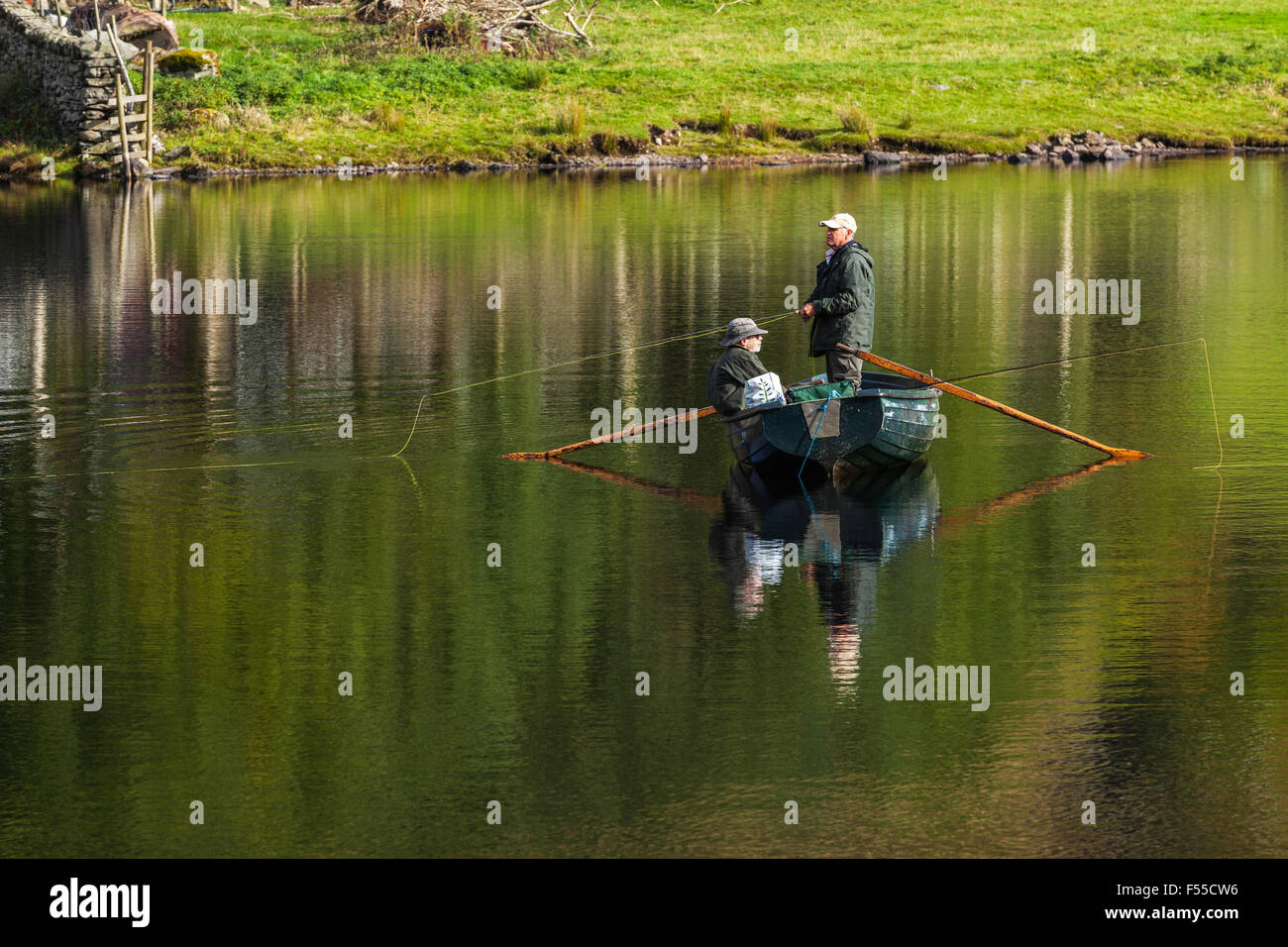Two Anglers in a Rowing Boat Stock Photo