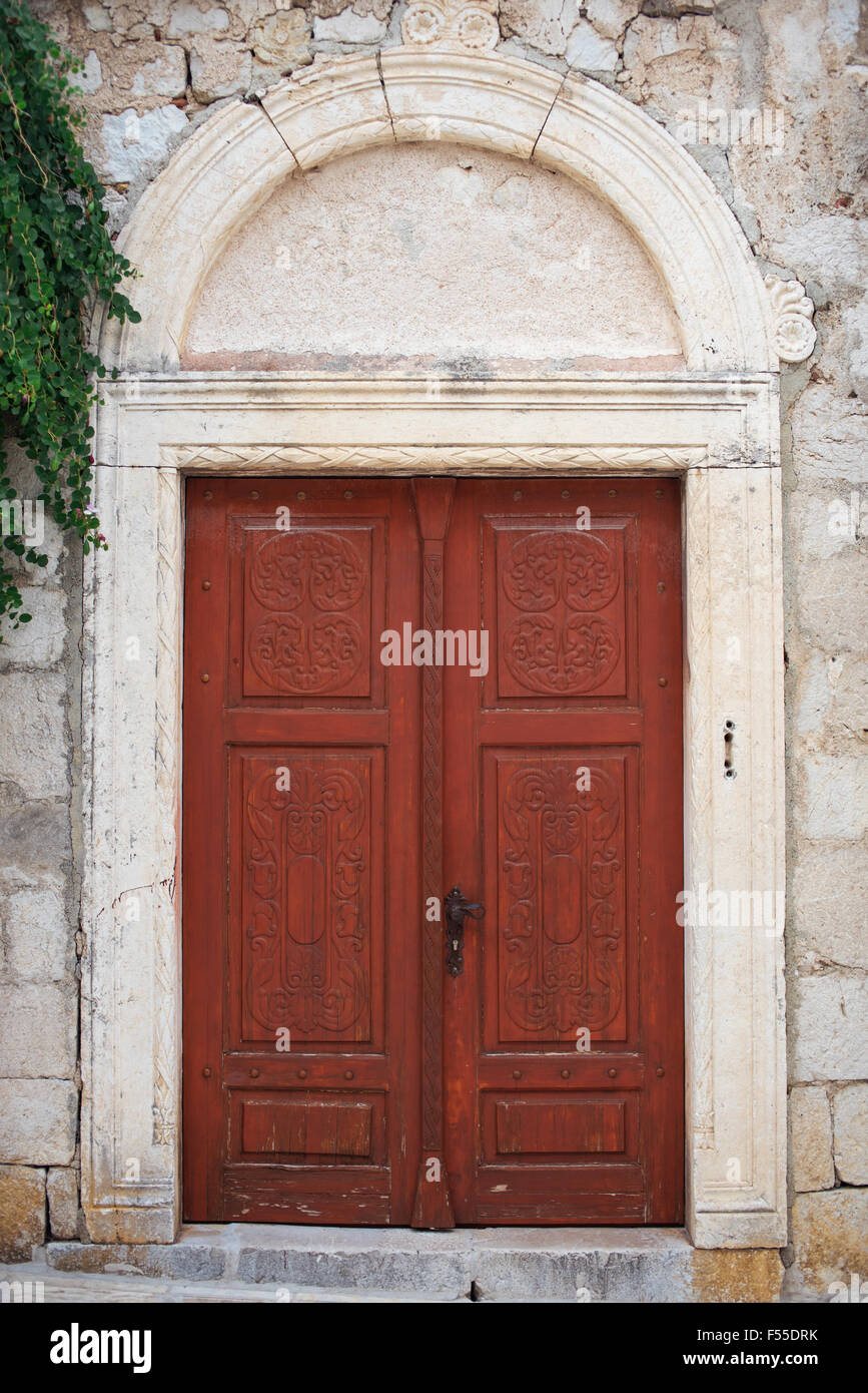 Old wooden door in city of Rab, Croatia Stock Photo - Alamy