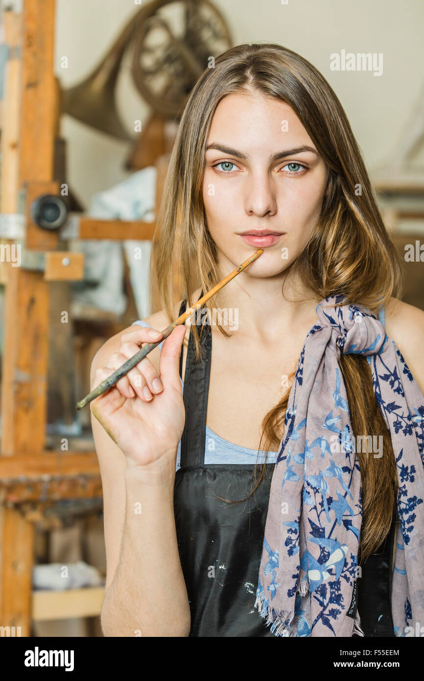 Portrait of confident female painter studio Stock Photo