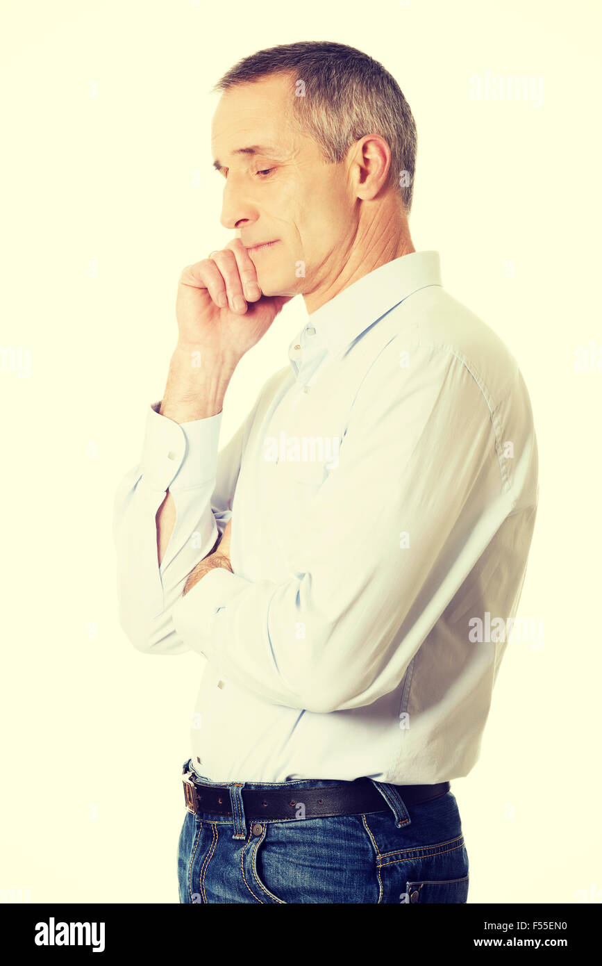 Old man touching face smiling hi-res stock photography and images - Alamy