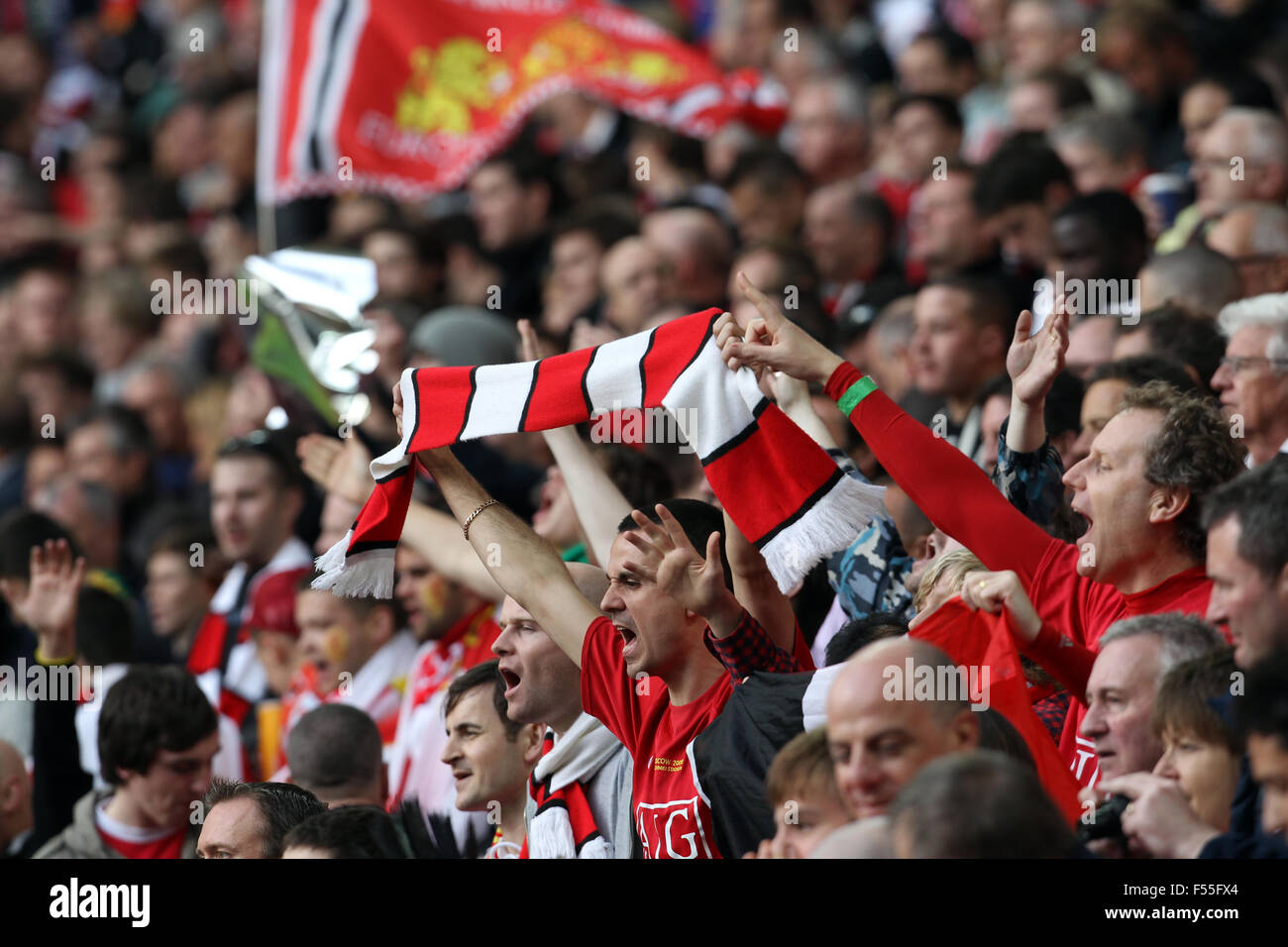 English football fans are seen at Wembley Stadium in 2013 Stock Photo