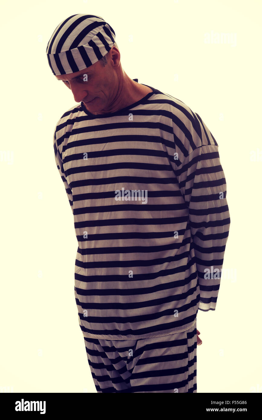 Caucasian man prisoner in striped clothes Stock Photo