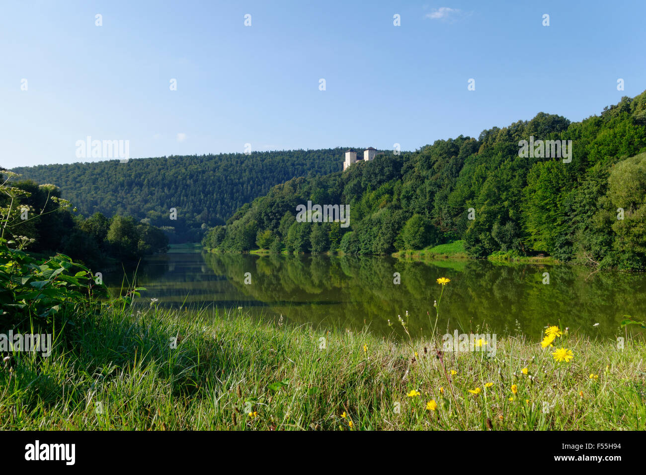 Austria, Koeszeg Mountains, Oberpullendorf District, View to Burg Lockenhaus with lake Stock Photo