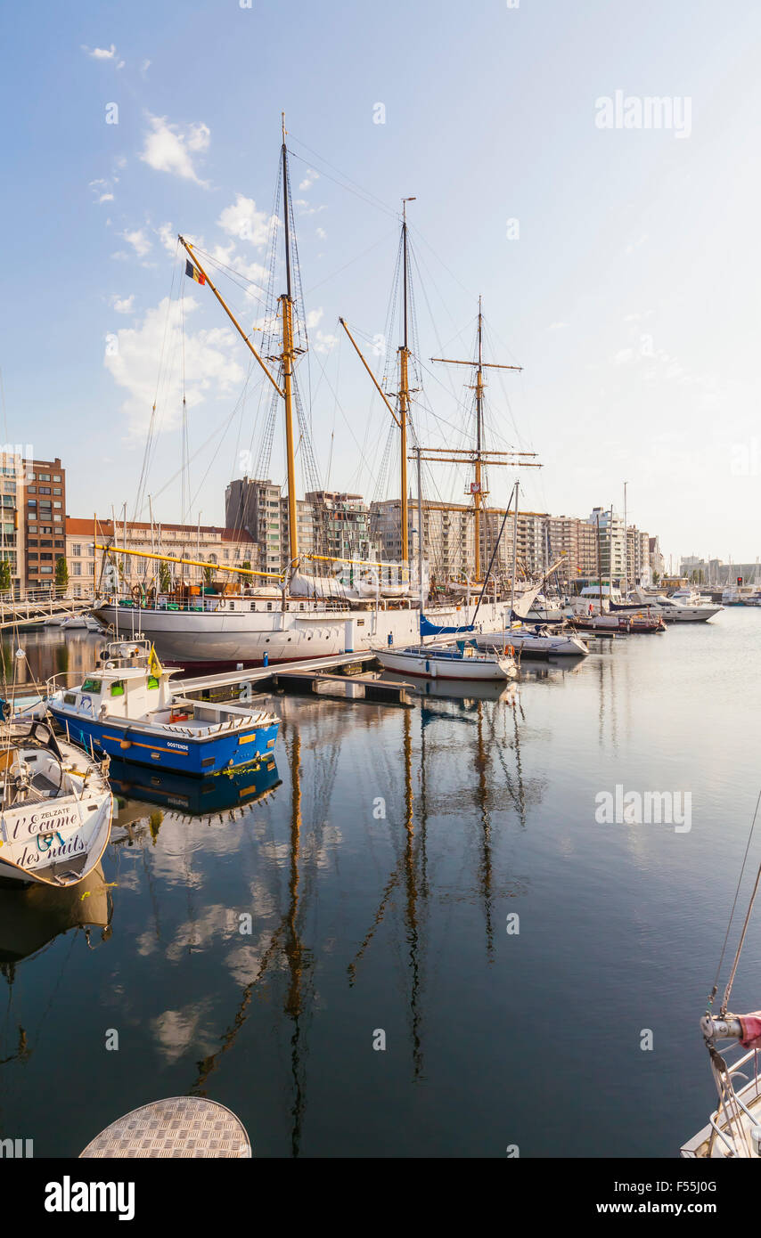 Belgium, Ostende, Drill ship Mercator and sailing boats at the yacht harbour Stock Photo