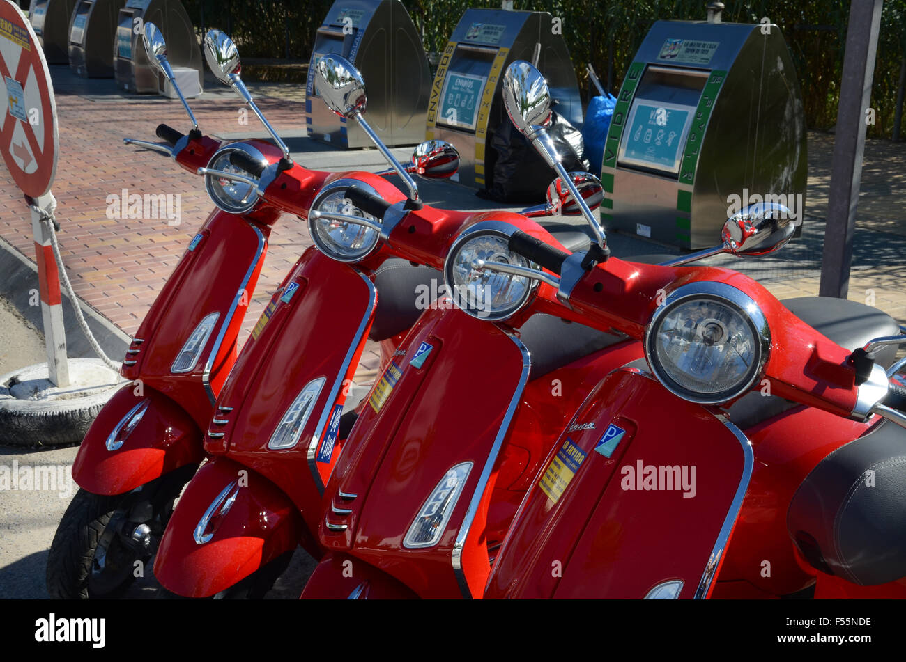 line up of rental scooters, Formentera Spain Stock Photo Alamy