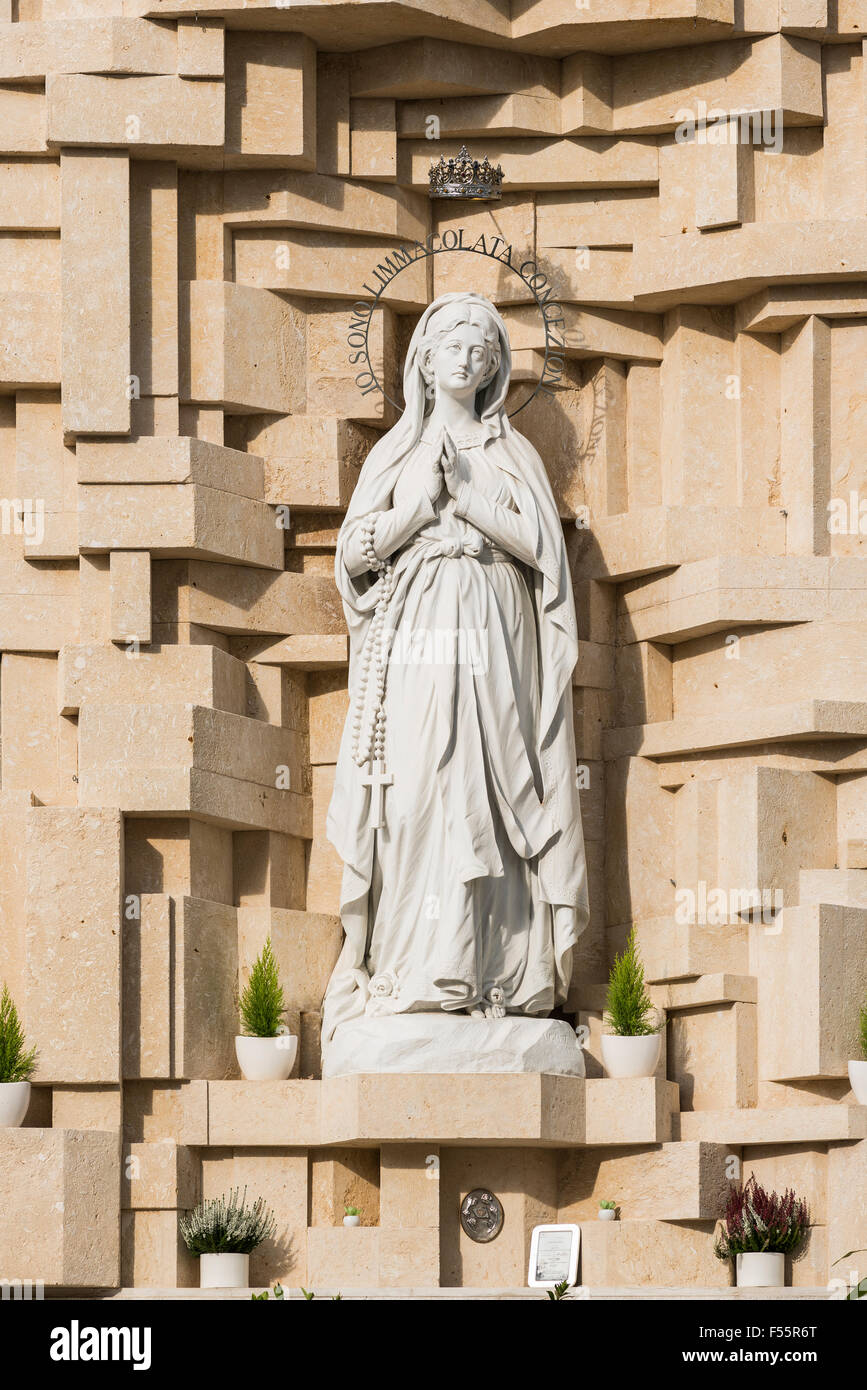 Statue of Our Lady of Lourdes, 1908, Santuario Nostra Signora di Lourdes monastery, Verona, Veneto, Italy Stock Photo