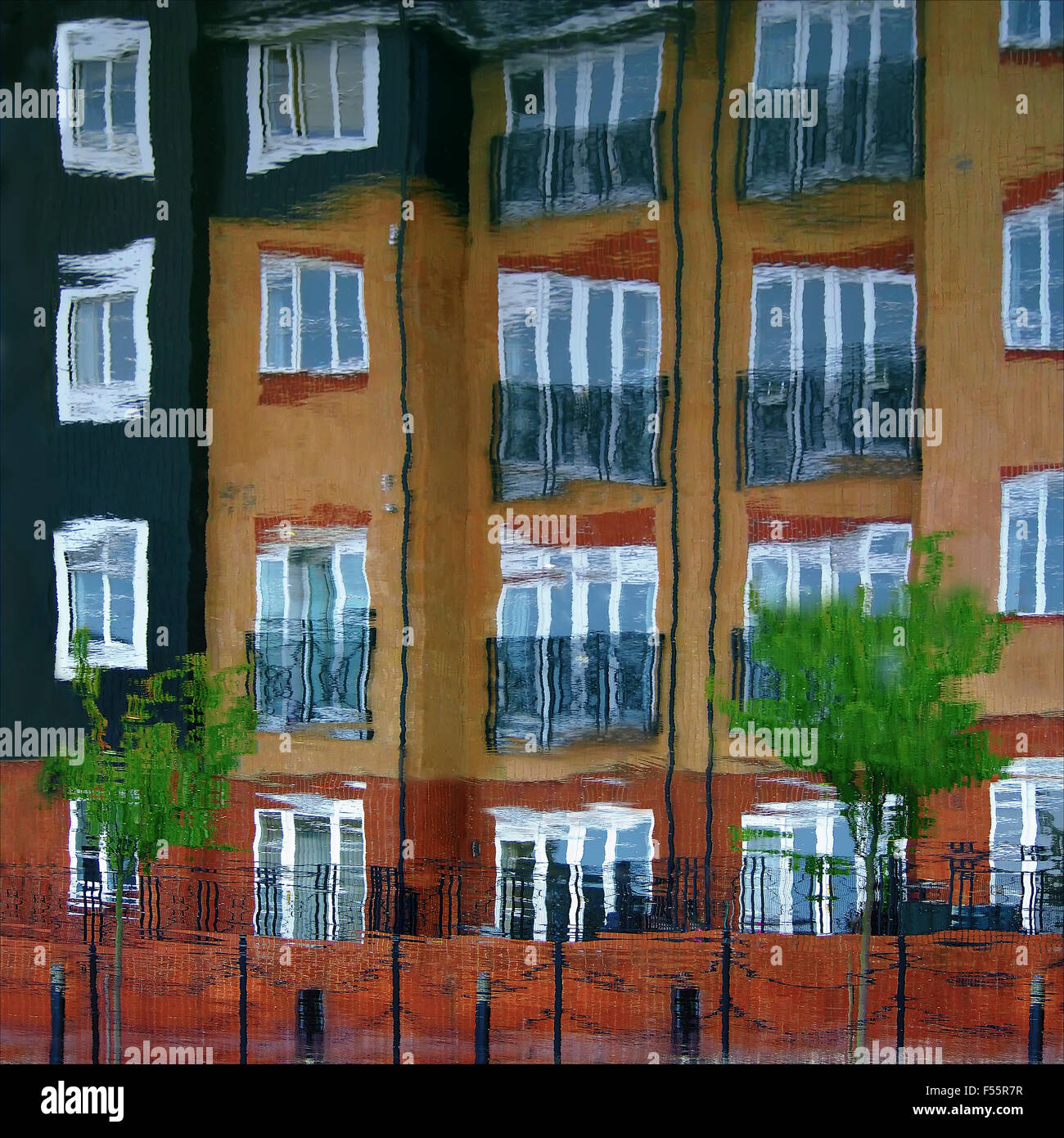 Kings Langley canal side apartments reflected in water. Hertfordshire