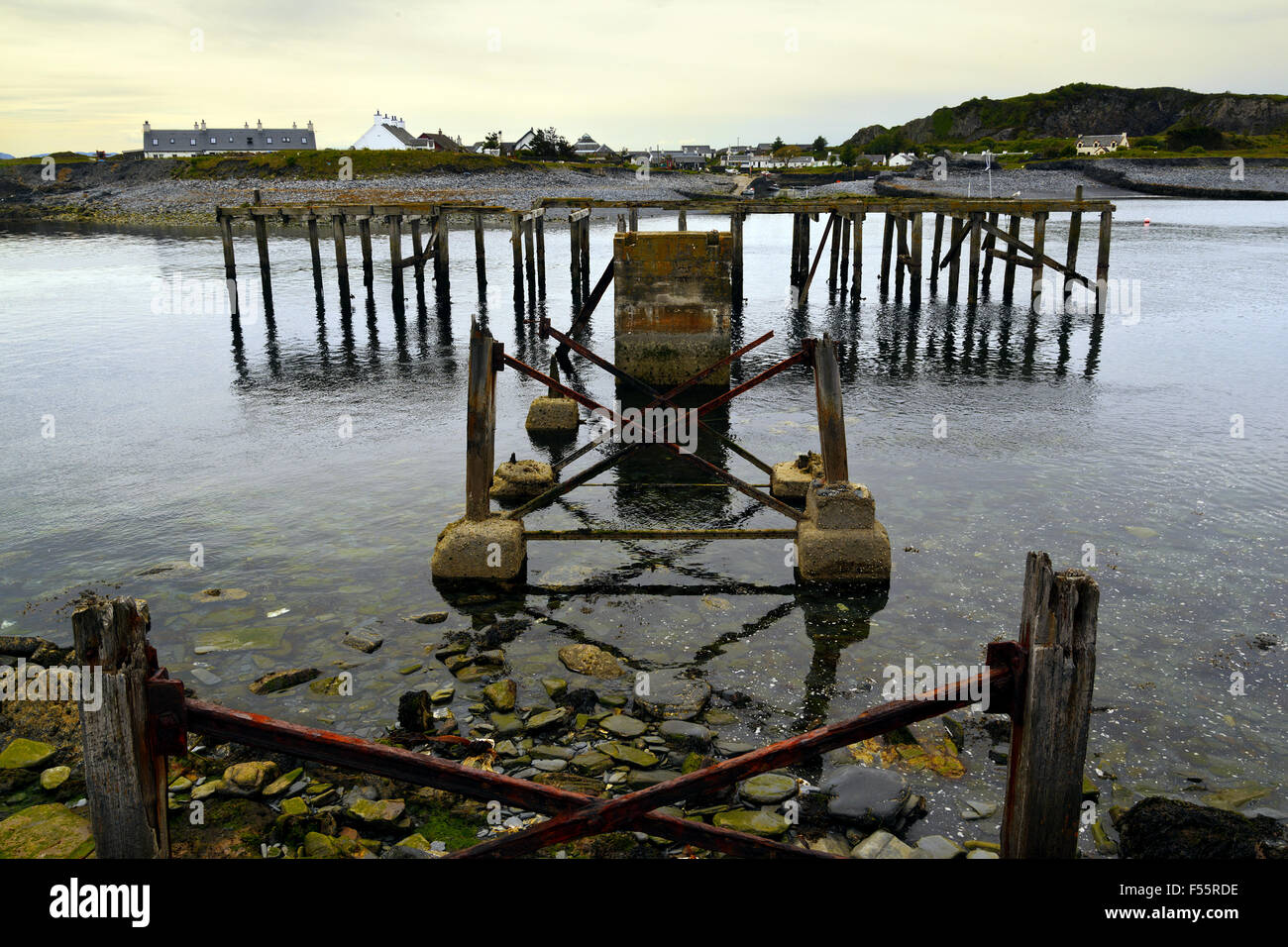 The derelict Pier at Ellenabeich on the Isle of Seil, Scotland Stock Photo
