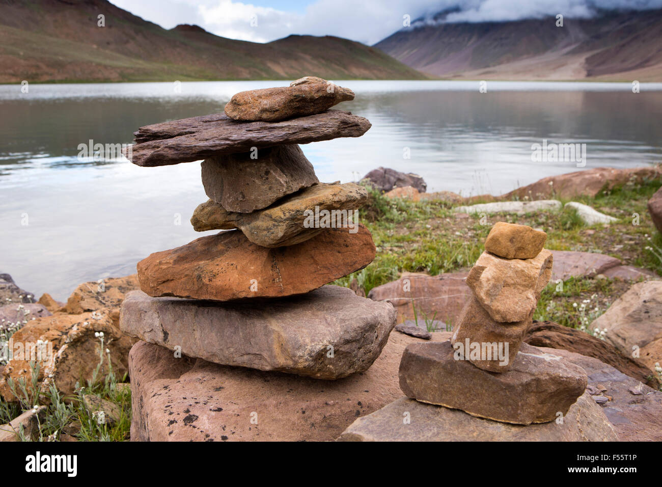 India, Himachal Pradesh, Spiti, Chandra Taal, Full Moon Lake, early morning, stone cairns on lake shore Stock Photo