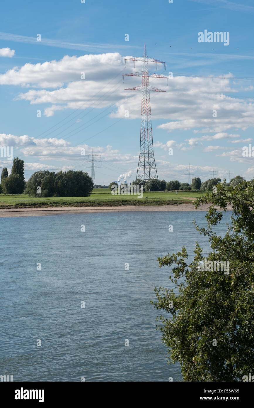 river rhine with blue sky and clouds, power lines and power plant Stock ...