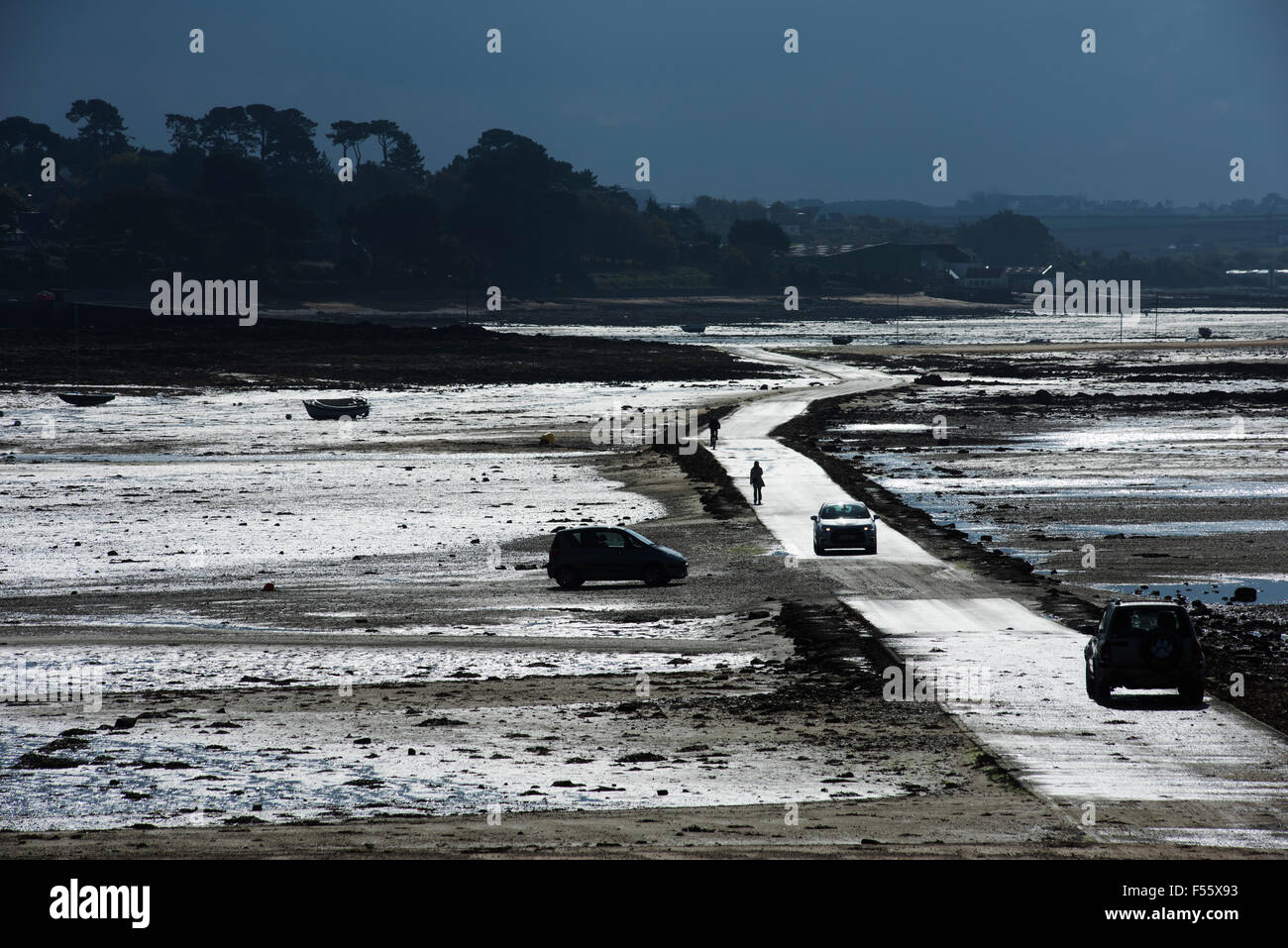 Carantec, Ile Callot, Brittany,France. October 2015 The road is submerged at high tide, at low tide walking the sea floor Stock Photo