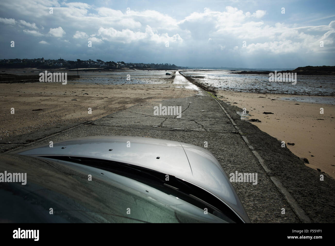 Carantec, Ile Callot, Brittany,France. October 2015 The road is submerged at high tide, at low tide walking the sea floor Stock Photo