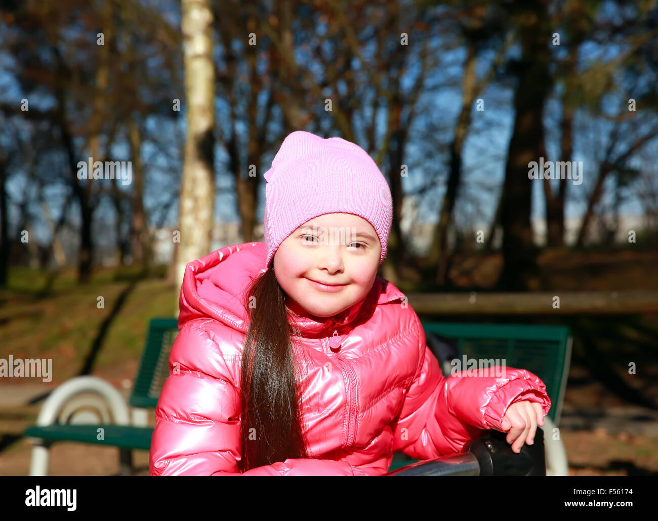 Portrait of beautiful girl on the playground Stock Photo - Alamy