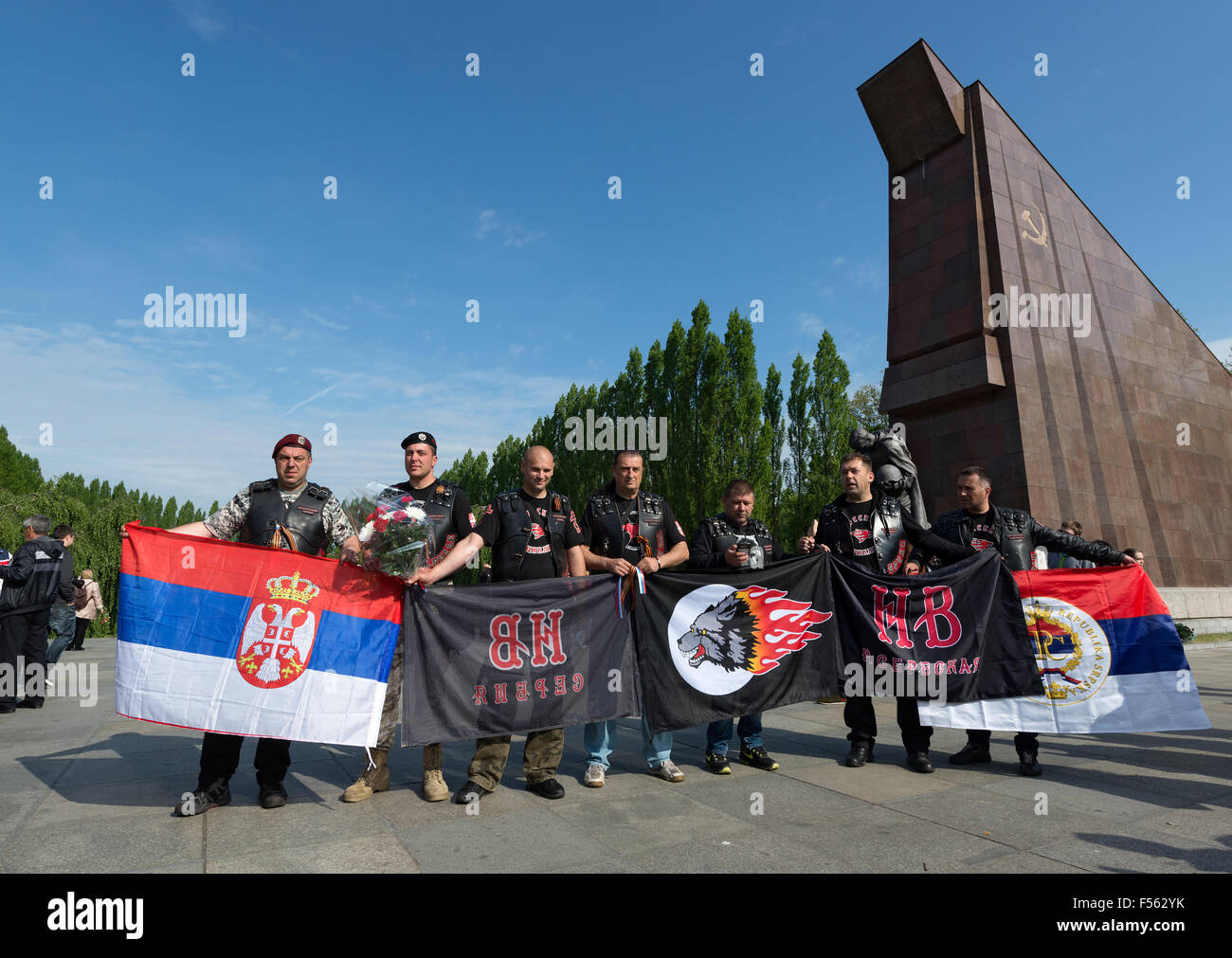 '09.05.2015, Berlin, Berlin, Germany - Soviet War Memorial Treptow, the 70th anniversary of the end of World War II that 9 May is considered in Russia as Victory Day over Nazi Germany, members of the Russian-nationalist Rocker group ''Nachtwoelfe'' Motorcycle Club, in the background Flag of the former Soviet Union. EBS150509D502CAROEX.JPG - NOT for SALE in G E R M A N Y, A U S T R I A, S W I T Z E R L A N D [MODEL RELEASE: NO, PROPERTY RELEASE: NO (c) caro photo agency / Schulz, http://www.caro-images.pl, info@carofoto.pl - In case of using the picture for non-journalistic purposes, please con Stock Photo