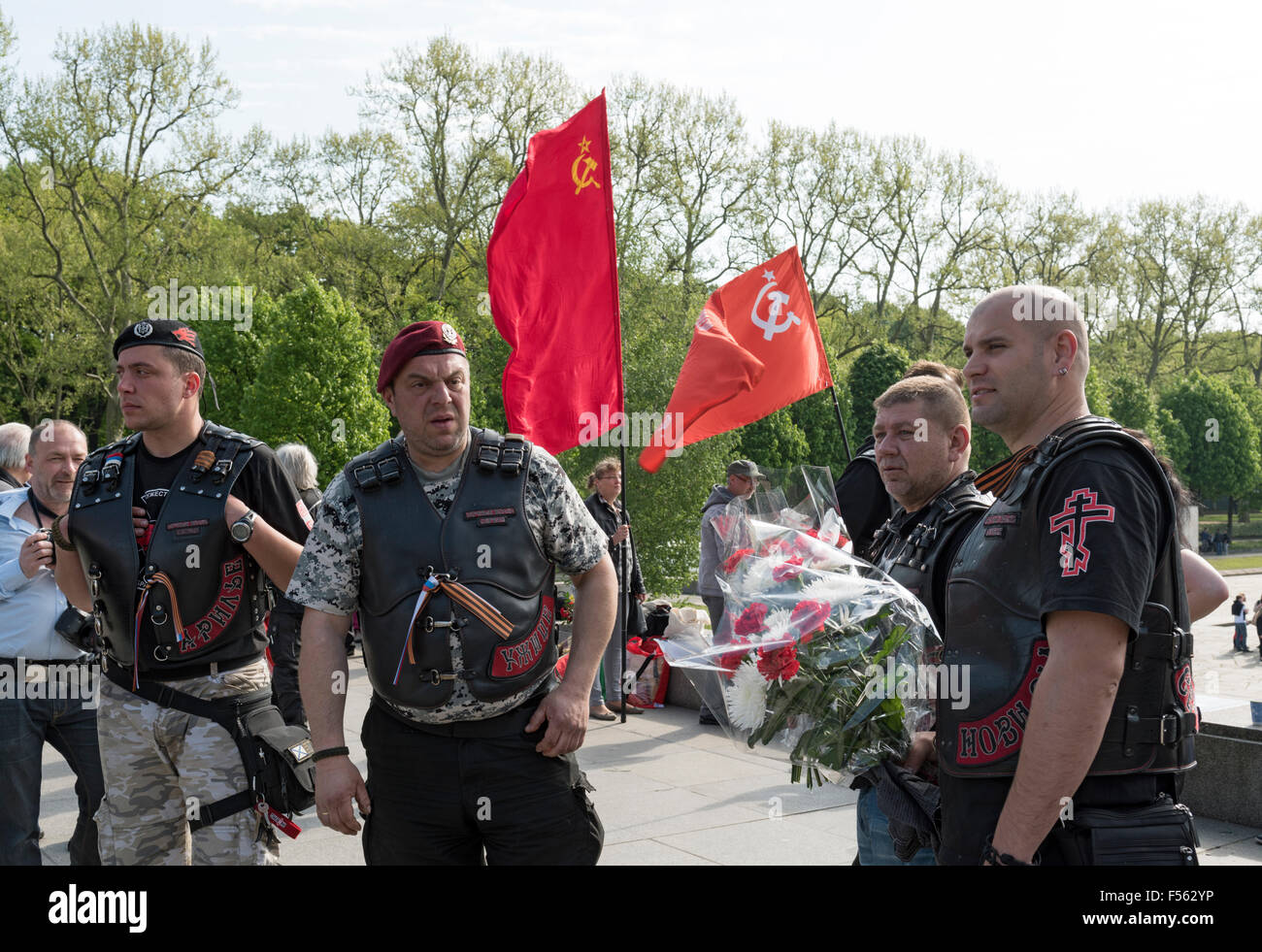'09.05.2015, Berlin, Berlin, Germany - Soviet War Memorial Treptow, the 70th anniversary of the end of World War II that 9 May is considered in Russia as Victory Day over Nazi Germany, members of the Russian-nationalist Rocker group ''Nachtwoelfe'' Motorcycle Club, in the background Flag of the former Soviet Union. EBS150509D503CAROEX.JPG - NOT for SALE in G E R M A N Y, A U S T R I A, S W I T Z E R L A N D [MODEL RELEASE: NO, PROPERTY RELEASE: NO (c) caro photo agency / Schulz, http://www.caro-images.pl, info@carofoto.pl - In case of using the picture for non-journalistic purposes, please con Stock Photo