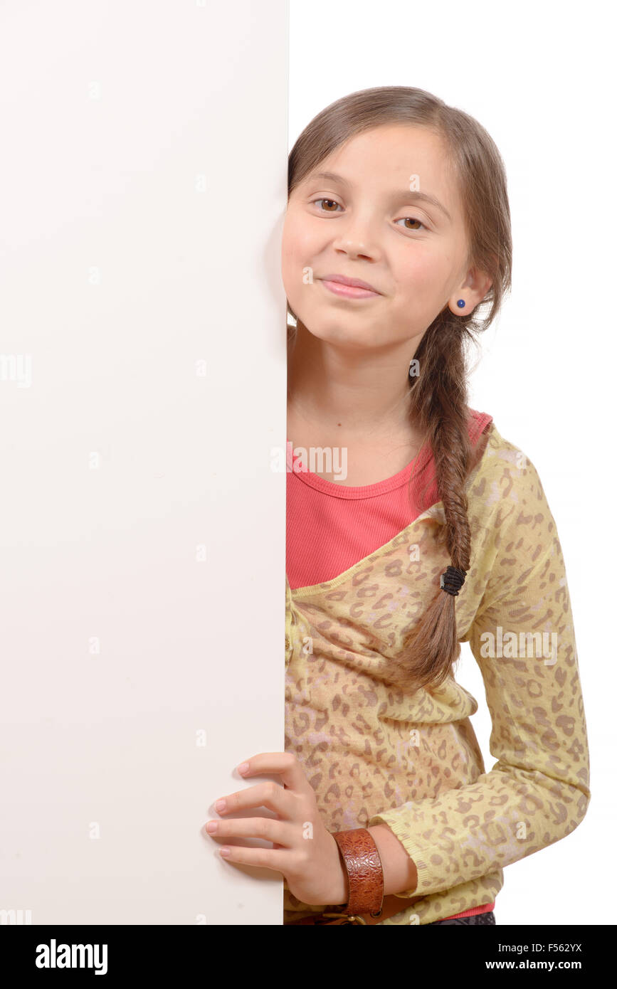 Beautiful young girl holding blank poster isolated on white Stock Photo ...