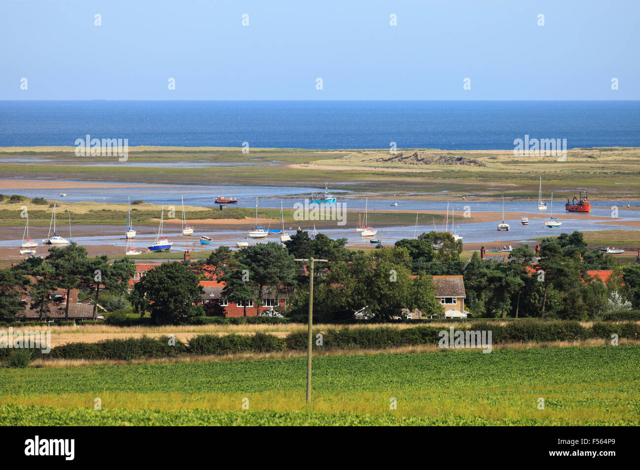 The village of Brancaster Staithe and Scolt Head nature reserve on the North Norfolk Coast, seen from Barrow Common. Stock Photo