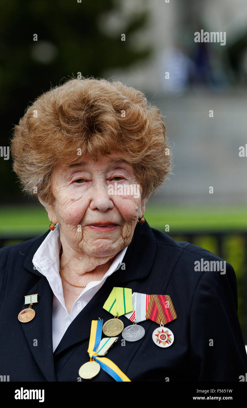 08.05.2015, Berlin, Berlin, Germany - Soviet War Memorial in the Tiergarten on the day of liberation. Red Army veterans from the modern Ukraine to honor their fallen comrades. Pictured is a veteran with medals and decorations in front of the Cenotaph. EJH150506D012CAROEX.JPG - NOT for SALE in G E R M A N Y, A U S T R I A, S W I T Z E R L A N D [MODEL RELEASE: NO, PROPERTY RELEASE: NO (c) caro photo agency / Heinrich, http://www.caro-images.pl, info@carofoto.pl - In case of using the picture for non-journalistic purposes, please contact the agency - the picture is subject to royalty!] Stock Photo
