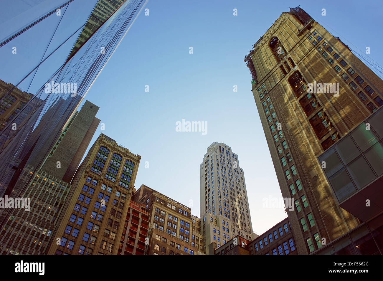 Modern glass skyscrapers under the clear blue sky in business district