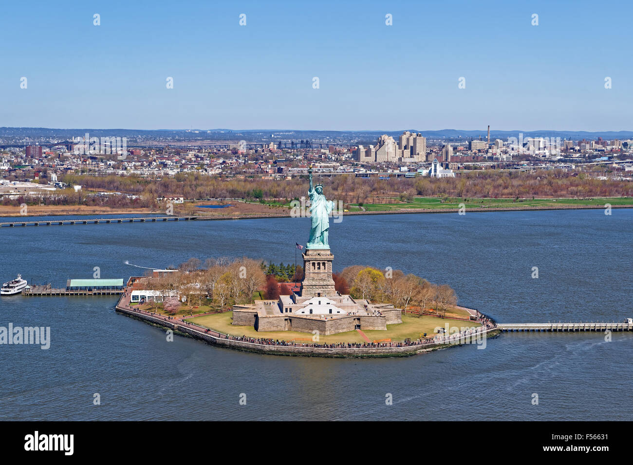 Aerial view of the Statue of Liberty in New York City with Downtown ...