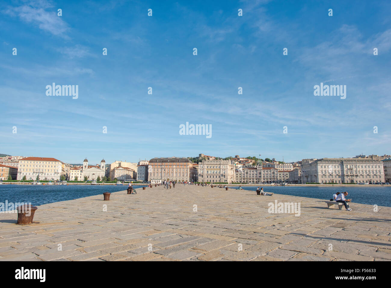 Trieste,molo,audace,waterfront, the jetty is a popular site for visitors and locals to walk along throughout the summer. Stock Photo