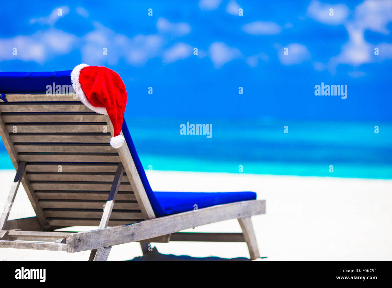 Sun Chair Lounge With Red Santa Hat On Tropical White Beach And Stock Photo Alamy