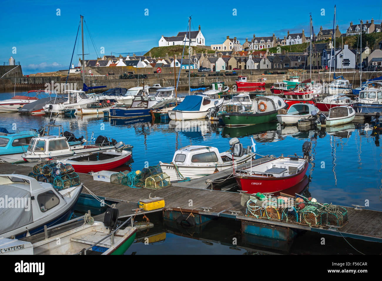 View of the Marina at Findochty on the Moray Firth, with the church and fishermen's cottages in the background. Stock Photo