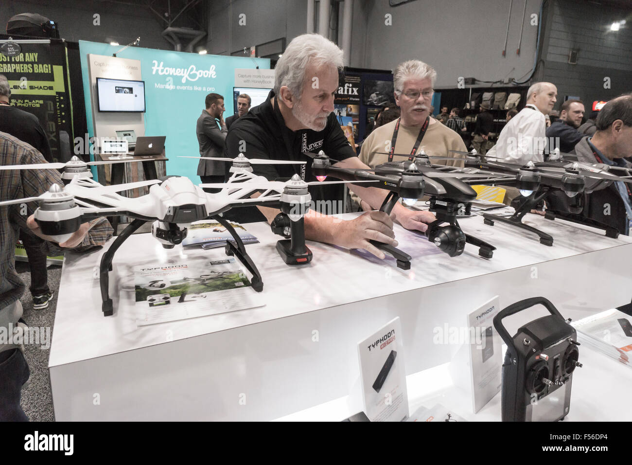 Commercial drones are displayed at a trade show in New York on Friday, October 23, 2015.  The US Dept. of Transportation has convened a task force to recommend parameters for drone registration, with a time frame that the regulations will be ready for Christmas. (© Richard B. Levine) Stock Photo