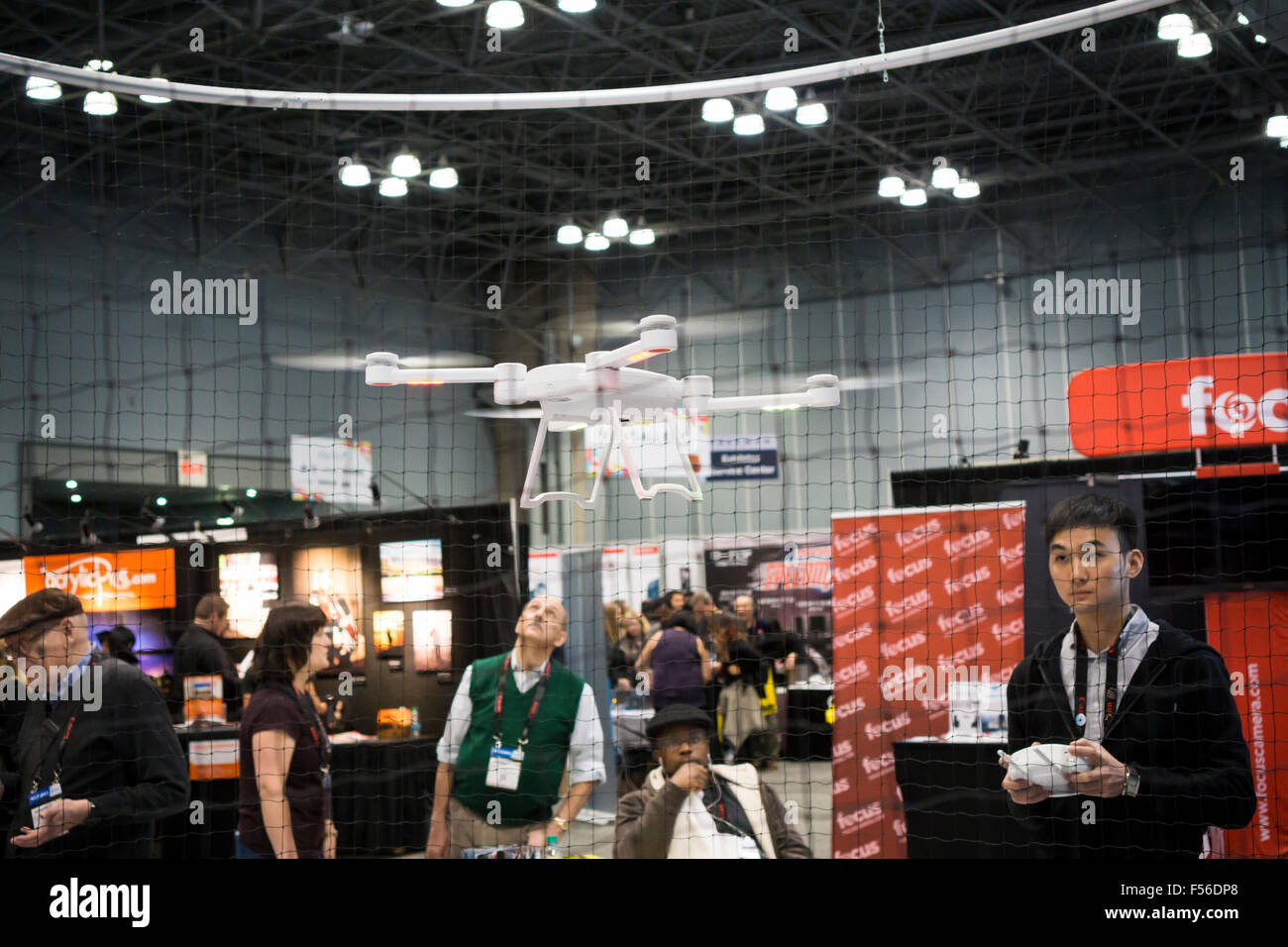 A commercial drone is demonstrated at a trade show in New York on Friday, October 23, 2015.  The US Dept. of Transportation has convened a task force to recommend parameters for drone registration, with a time frame that the regulations will be ready for Christmas. (© Richard B. Levine) Stock Photo