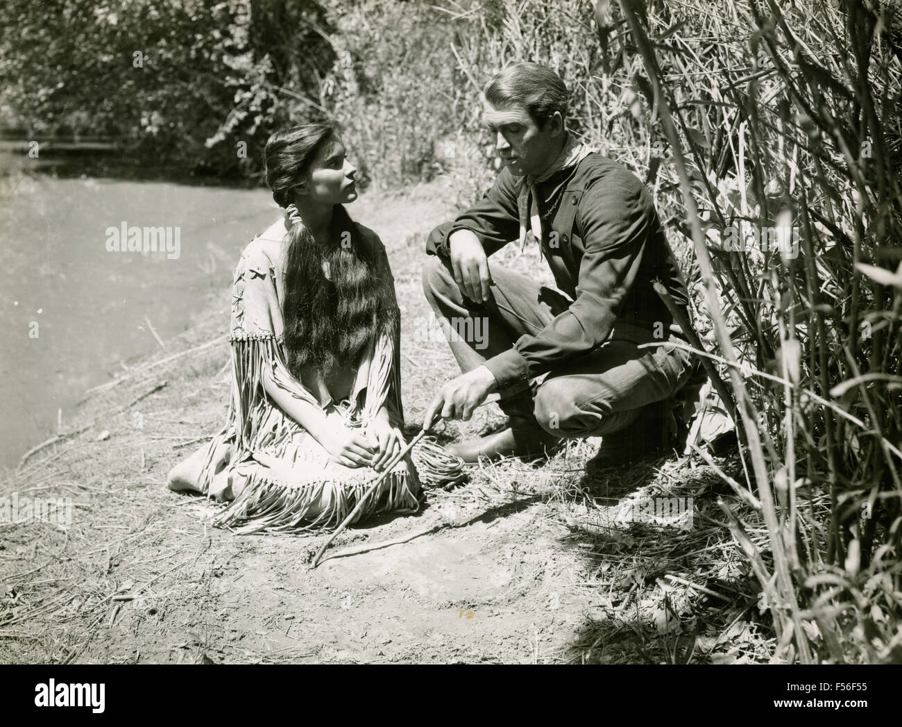 The actors Debra Paget and James Stewart in a scene from the film 'Broken Arrow' Stock Photo