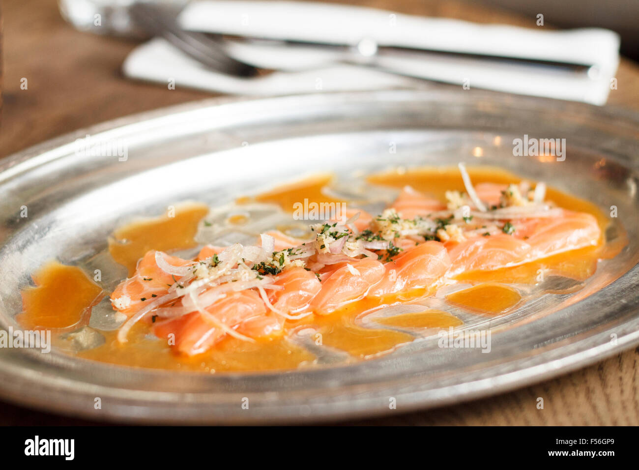 Carpaccio of Scottish salmon with horseradish, shallots, lemon