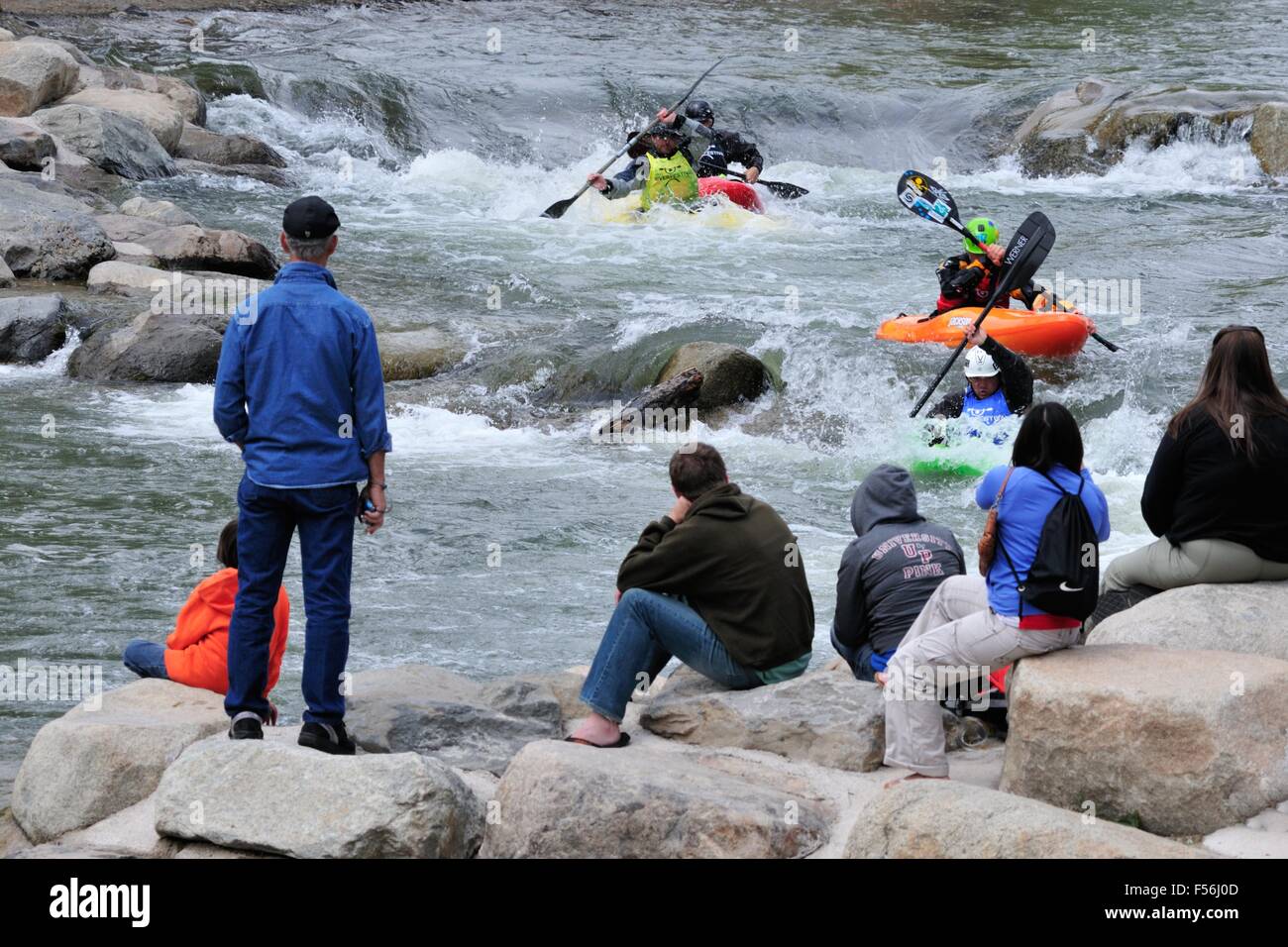 Spectators watch intently as boatercross contestants vie for the lead during the 2010 Reno River Festival Stock Photo